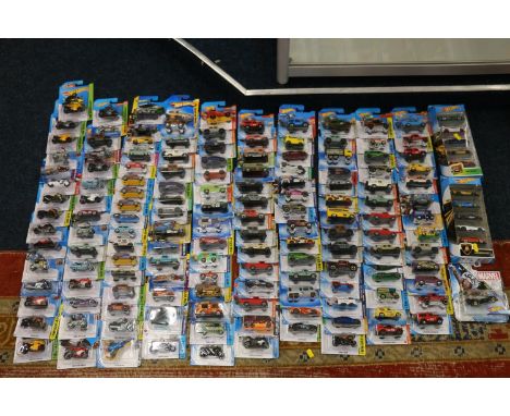 Approximately one hundred and fifty Mattel Hot Wheels diecast model vehicles including motorbikes, two five-car sets etc., ea