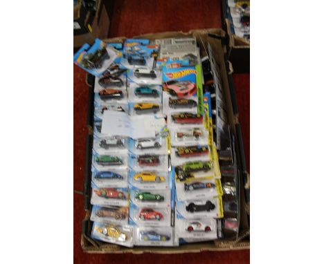 Approximately one hundred and twenty Mattel Hot Wheels diecast model vehicles, each carded. ref#Box11 (120) 