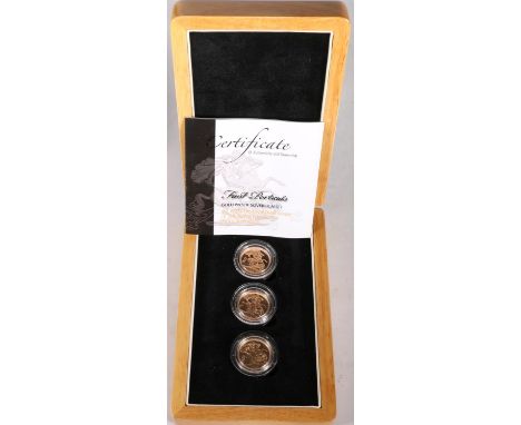 The London Mint Office First Portraits gold proof sovereign three-coin set comprising UNITED KINGDOM Queen Elizabeth II (1952