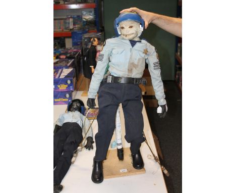 Two large puppet figures of Gerry Anderson's Space Police (1986) characters Officer Dicks and&nbsp;Officer Cathy Costello (Ca