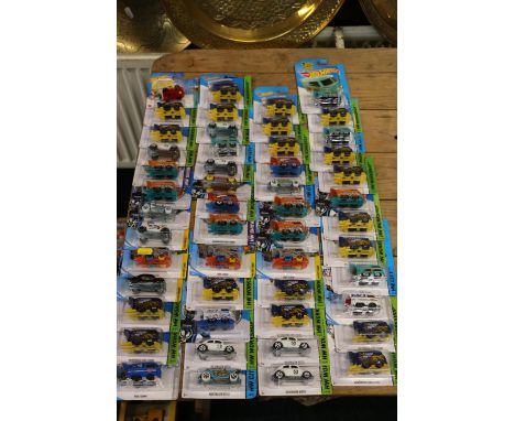 Approximately fifty Mattel Hot Wheels diecast campervan and other model vehicles, each carded. ref#Box8 (50) 
