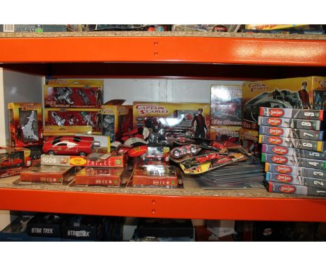 Captain Scarlet. Shelf of collectables comprising of boxed models by Bandai to include a DX Rhino Tactical Response Unit 9502