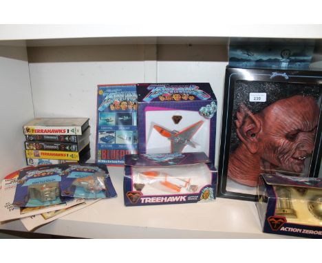 Terrahawks. Shelf of collectibles to include a boxed Zelda Limited Edition Collector's Mask, a boxed Action Zeroid by Bandai 