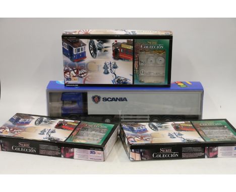 Emek of Finland 1:25 scale 85004 Scania Topline box van and three OcCre Ocio Creative tram car model kits, each boxed. (4) 