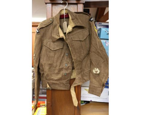 WWII era khaki green battledress blouse serge with The Wholesale Bespoke Tailoring Co Ltd label dated 'JAN 1941', Size No11, 