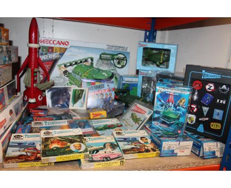 Thunderbirds collectible toys including Meccano Thunderbird 2 set, Anderson Entertainment badges, six Arrow Films 8mm silent 