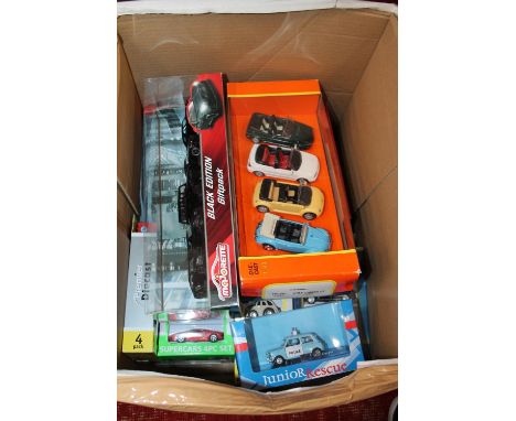 Approximately fifty diecast model vehicles including Schuco, Marjorette, Cararama, Oxford, Corgi etc., each boxed. ref#Box4 (