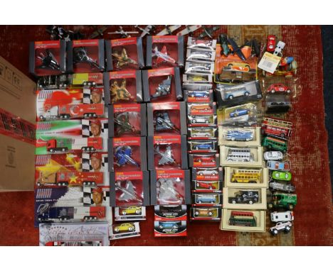 Over sixty diecast model vehicles including Corgi, Tesco, Lledo, RealToy, Mattel etc., most carded or boxed. ref#Box23&amp;28