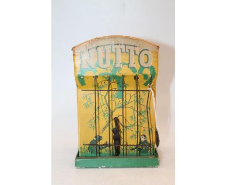 1950's Nutto swinging monkey acrobat automaton, 21.5cm tall. 