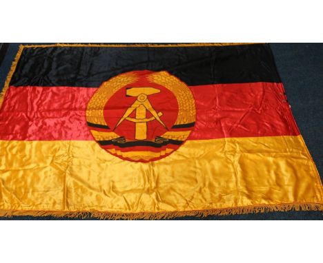German Democratic Republic political works flag with compass and hammer in wreath design, the reverse with 'FUR HERVORRAGENDE