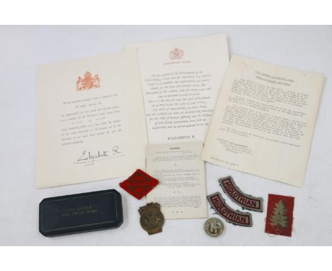 Medal of 701 M Latto of the Women's Timber Corps Women's Land Army comprising Civil Defence Long Service medal [unnamed] boxe