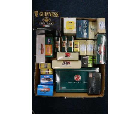 Twenty-three boxed Corgi diecast model vehicles to include 95106 1:18 scale MGB, 59563 Guinness, 35004 London Transport, Comm