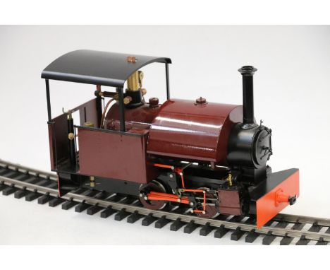 Accucraft BMMC G scale model railways, a 1:19 scale live steam 0-4-2 saddle tank locomotive in maroon black livery, 32cm long