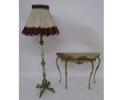 An onyx and gilt metal standard lamp on quadrupedal base and an onyx topped serpentine hall table with gilt metal base (2) Co