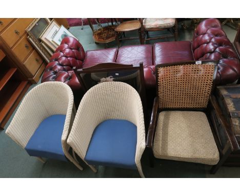 A Lot comprising two Lloyd loom style armchairs, mahogany framed cane back armchair and a firescreen (4) Condition Report: Av