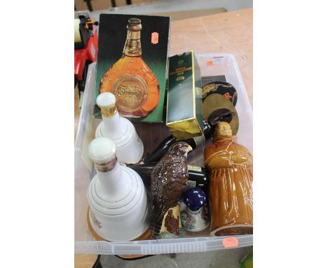 Two Bell's commemorative Scotch whisky decanters; Johnnie Walker Swing whisky decanter in carton; Whyte &amp; Mackay Buzzard 