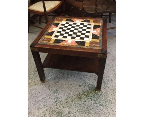 A marble topped With chess board table in oak