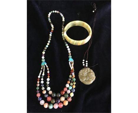 A bangle and a necklace in rose, jade etc and a jade pendant.