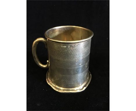 A small silver tankard by R & Co hallmarked Birmingham 1934-35 (62g)