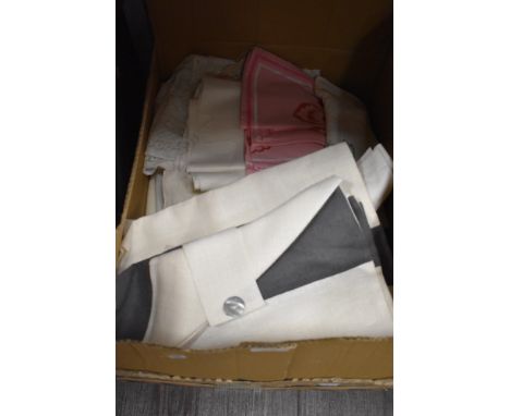 A box of mixed vintage and modern table linen and similar.