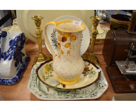 Three ceramic bowls including Royal Doulton Australian 1887 Queen Victoria a Bewley water jug and pair of brass candle sticks