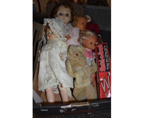 A selection of child dolls and a boxed Sketch a Graph