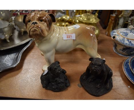 A Melba ware figure of a Bull terrier and two similar