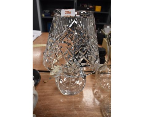 A clear cut crystal lamp base and light shade