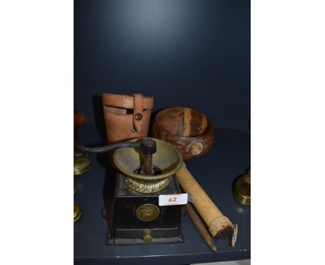 A cast iron and brass antique coffee grinder by Kenrick and two containers
