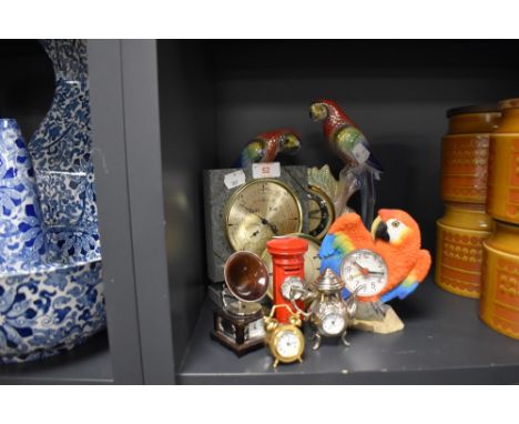 A selection of vintage and modern clocks including bright lustre finish parrot mantel clock embossed to underside with Jema H