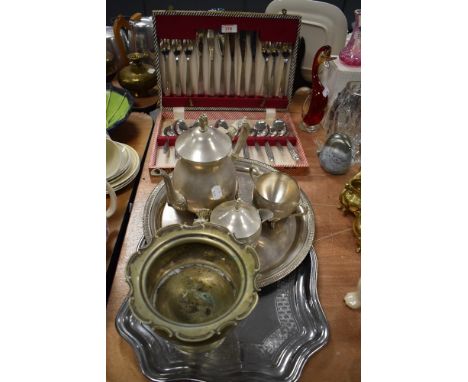 A variety of flat ware and a vintage canteen of cutlery.