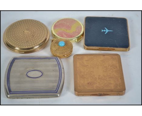 A collection of ladies vintage compacts to include Stratton, Caimant, faux turquoise set, airplane set and a silver plate and