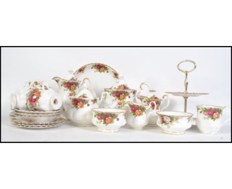 An extensive Royal Albert bone China tea service consisting of teapot, water pot, trio's, creamer, sugar bowl etc please see 