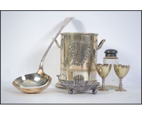 A collection of silver plated items to include a soda syphon stand, egg cups and Mappin and Webb bon bon dish together with a