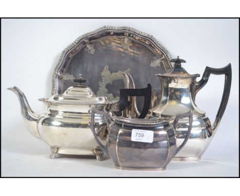 A 20th century Mappin and Webb silver plated three piece tea service consisting of teapot, coffee pot and sugar bowl together