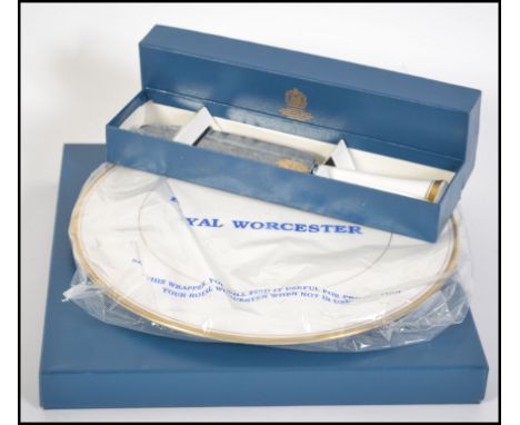 A boxed Royal Worcester cake plate in the ' Viceroy Gold ' pattern along with a matching Royal Worcester cake slice again in 