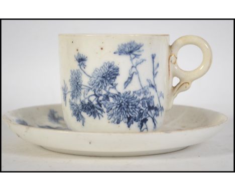 A 19th century Royal Worcester blue and white teacup and saucer having puce marks to the underside for
