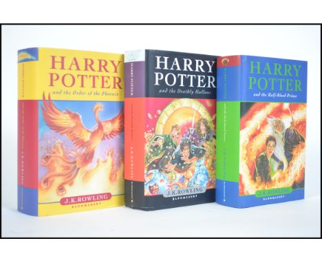 A group of three J K Rowling Harry Potter hard back 1st edition books to include ' Harry Potter and The Deathly Hallows ', 'H