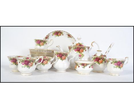 Royal Albert ' Old Country Roses ' tea service to include : Teapot; tray with creamer; sugar bowl; lidded preserve jar with o