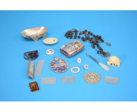A set of vintage rosary beads and a collection of mother of pearl items.