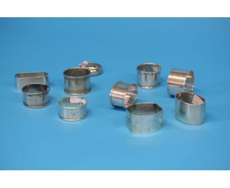 A Collection of 9 silver napkin rings, various dates and a Maltese silver napkin ring.  Total weight 219.3 grams/7 oz