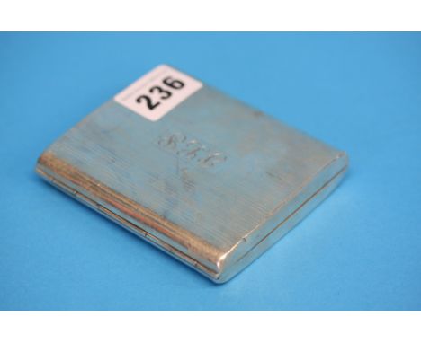 A Sterling silver cigarette case with engine turned decoration.  Weight 175 grams/5.6 oz