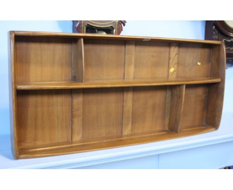 An Ercol Golden Dawn dresser with delft rack.  107 cm wide