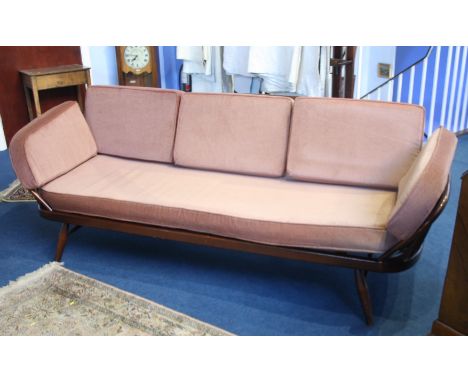 An Ercol oak day bed.