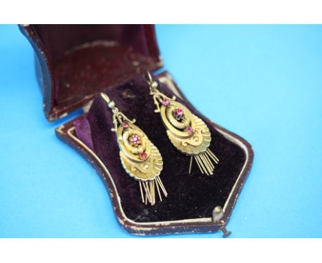 A pair of boxed Victorian yellow metal (15ct ?) ruby set tassel earrings.