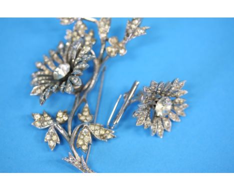 Two Mitchell Maer for Christian Dior past brooches.