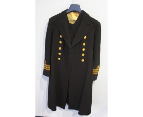 A Naval Officer's suit to include tunic, waistcoat, trousers, sash etc.