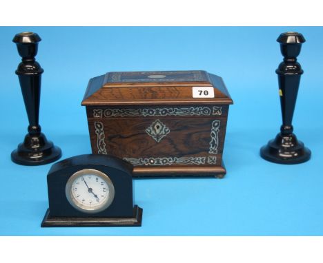 A Victorian Rosewood tea caddy with mother of pearl banding and an ebonised clock garniture.  22 cm wide.