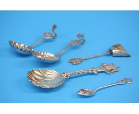 A Continental silver spoon with import mark London 1902, a silver Jubilee spoon, date 1887, another dated London 1899, a Role