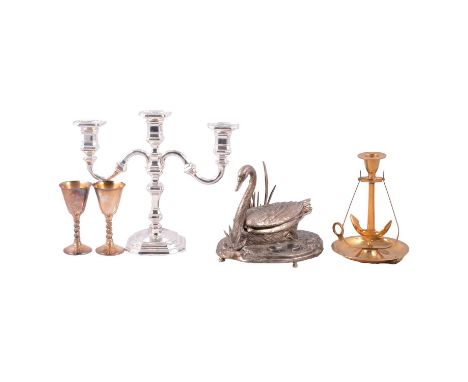 A brass fireside companion set; a novelty swan ashtray and match striker; onyx candlestick, egg etc; a silver-plated six bott